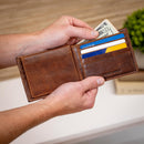 Pittsburgh Penguins, Embossed 100% Genuine Tumbled Leather Passcase Bi-Fold Wallet, Brown