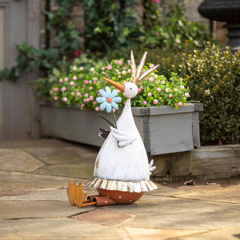 Metal Duck Holding Flower Statuary