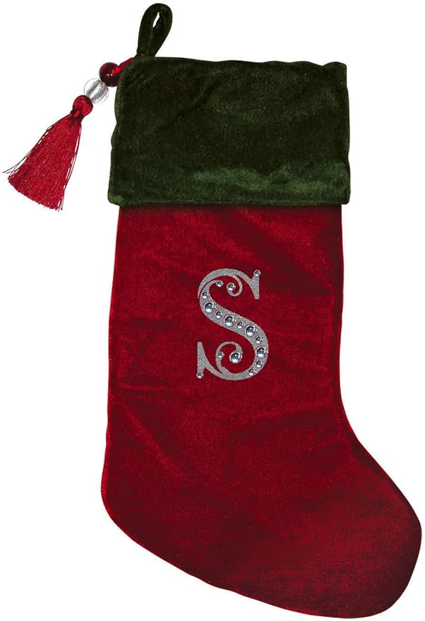 Classic red and green velvet Christmas stocking, finished with a decorative tassel. A perfect festive touch for those who prefer a simple, elegant design.