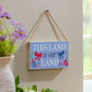 American Classic Red White & Bows Wood Hanging Sign w/ Rope, "This Land Is Our Land", 11"x6"
